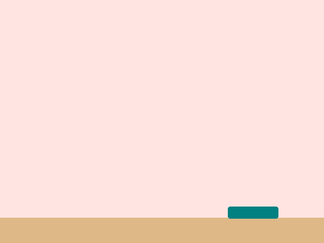 A bakery scene where a teal basket has slid to the right of the center, above a wooden counter.