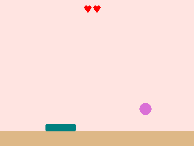 A bakery scene with a teal basket on the left, a cupcake falling on the right where it can't be caught, and two red hearts at the top showing two lives left.