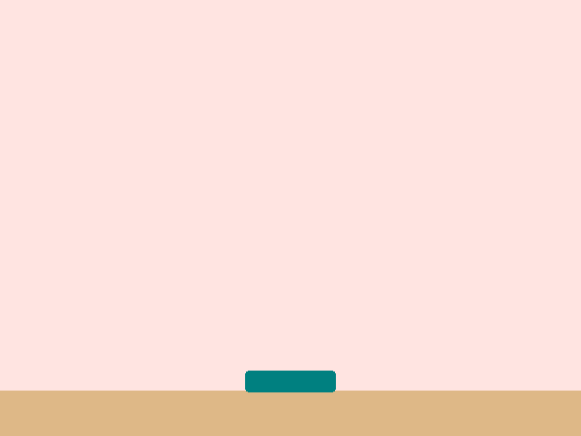 A pink game window with a wooden counter and a wide teal basket sitting just above it in the middle.